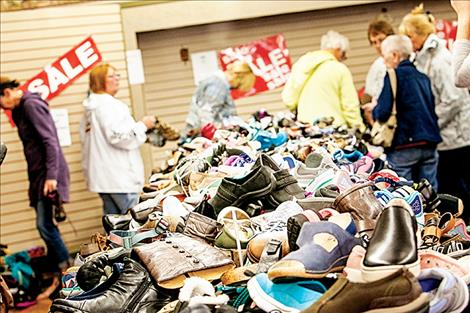 People lined up starting at 7 a.m. for the last big sale at 221 Main Street. 