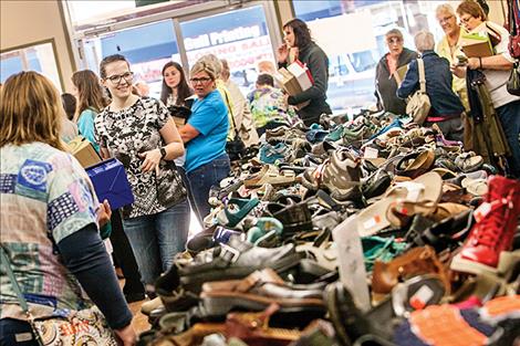 Main Street, Polson sparkles thanks in part to beautification efforts organized by Jackie Cripe. 