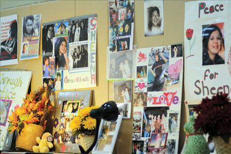 A memorial featuring pictures of Sheena and Howard shows the two smiling in every picture.