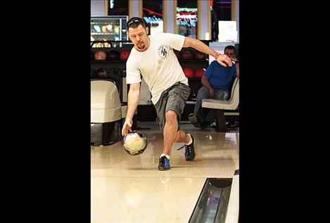 Marcus Sands practices his game at Sportspage Bowl in Polson.