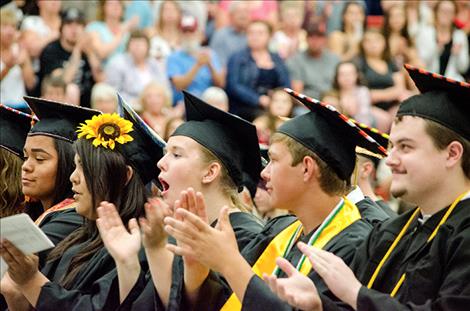 Ronan grads  applaud graduation  speakers.