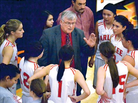 Head coach Richard Bachmeier instructs the Arlee Scarlets during the District 14-C tournament two weeks ago. The Scarlets were undefeated until their meeting with Gardiner in the first round of divisionals last weekend.