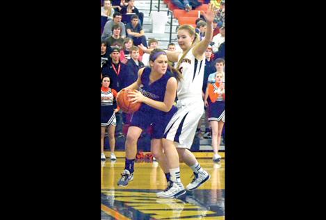 Jessica Bagnell rounds the corner toward the bucket Friday against Frenchtown.