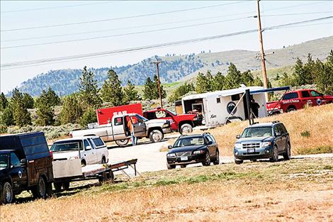 Search and rescue  crews  set up  near SKQ Dam to  look for a  man who fell into the river below the dam’s scenic  overlook.