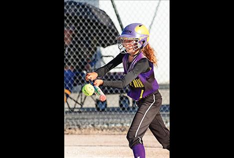 Polson Purple Wave’s Nikki Kendall lays down a bunt during the championship game.