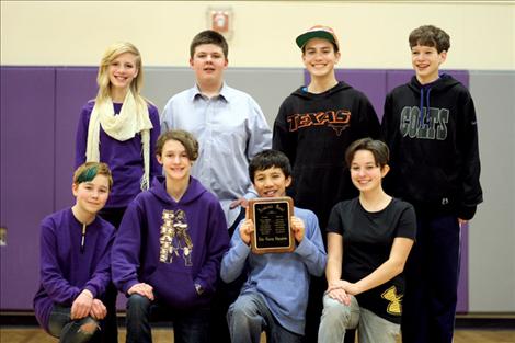 Polson students Hannah Madsen, Carson McDaniel, Timothy Russell, Matthew Sitter, Geneva Des Lions, Anna Young, Linde Lambson and Sierra Garcia pose for a group portrait after winning Polson’s third straight Lake County Academic Bowl. 