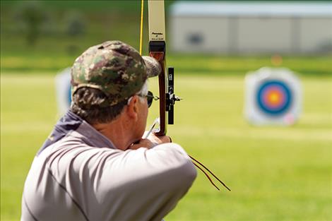 Bob Byers of Polson takes aim at gold.