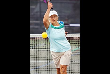 Pat Bauerle serves the ball.