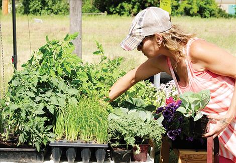 Vegetables and and herbs are also for sale at Arlee’s market.