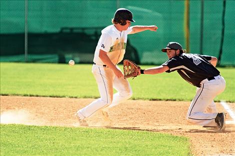 Mission Valley Mariner Jacob Harrod beats a ball thrown back to first base.