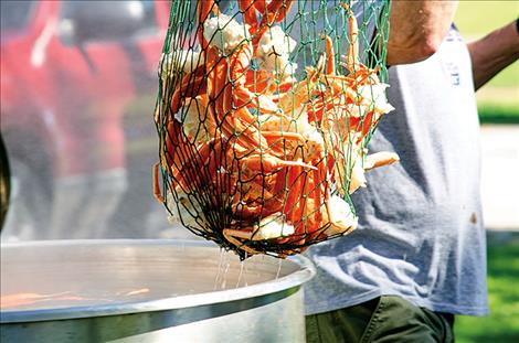 More  than 600 pounds  of crab is boiled  in an 80-gallon pot, one batch at a time.