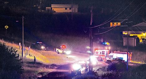 Emergency crews respond to a crash on Kerr Dam Road.