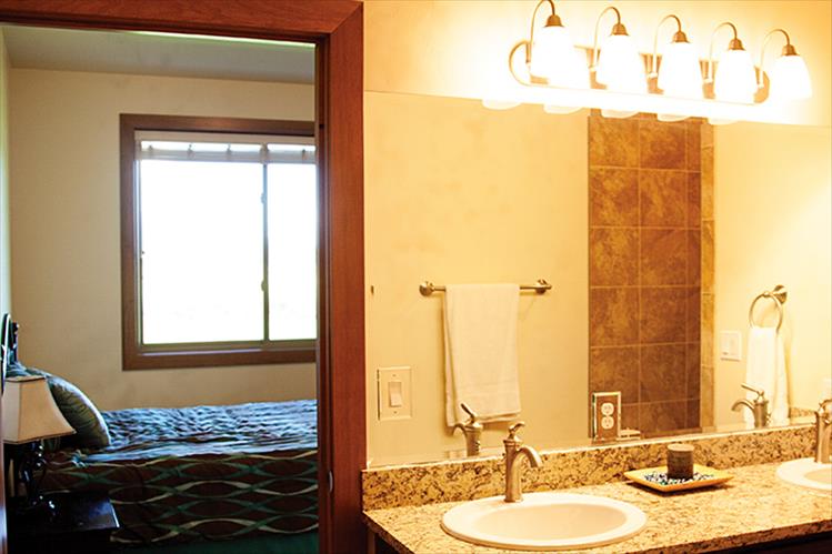 Upscale bathrooms offer a touch of luxury.