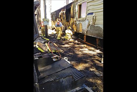 A trailer caught fire on Light Road after a spark caught pine needles on fire.