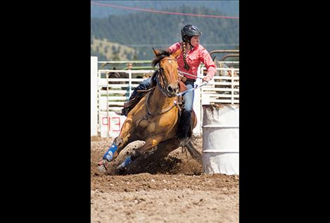 Haley Weible of Charlo scores a 14.95 during the barrel race.