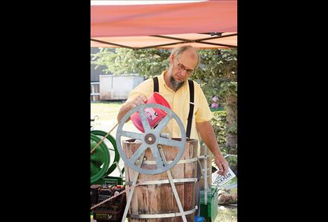 Robert Miller churns homemade ice cream.