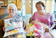 Church donates layettes