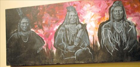 An example of Ben Pease’s work, a  painting of three Crow chiefs, hangs in the Native American Art Invitational show at the Sandpiper Gallery.