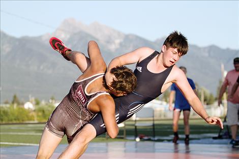 Owen Brown  flips his  German  opponent.