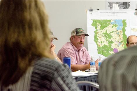 Flathead Irrigation District Commissioner Paul Guenzler asks if the board can do anything to help Flathead Indian Irrigation Project Manager Pete Plant with irrigation matters this season.