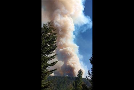 Posted on the Division of Fire’s Facebook page on July 26, the photo shows a plume of smoke from the Liberty fire which, as of Monday morning, has burned more than 1,800 acres of Mission Mountain tribal wildnerness.