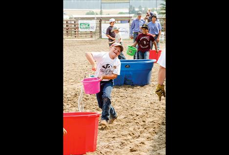 n this competition, some participants ran so fast across the arena all their water had sloshed out of their buckets.