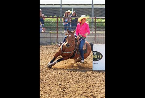  Abby Knight makes the turn on barrel number two.