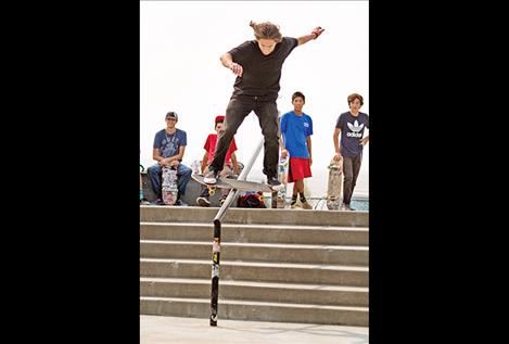 Adrian Garcia slides the rail.