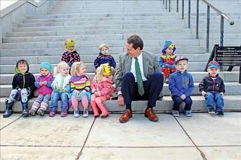 Governor Steve Bullock visits with students.