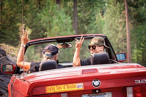 Father and son drive away together.