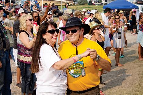 Cindi Belle Boothe and Tom Berglund dance to the Mission Mountain Wood Band.