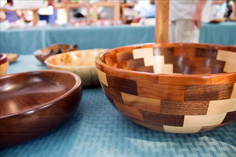  Hand carved bowls on display at the Sandpiper Art Festival.