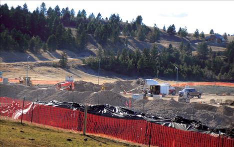 Looking across the site of the Walmart Supercenter towards Cougar Ridge gives a new perspective on the construction. The weather’s cooperated with a mild winter.