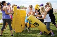 Charlo moms don tutus for annual Guts and Glitter Football Clinic