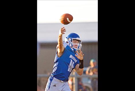 Bulldogs’ quarterback Troy Mitchell throws a pass.