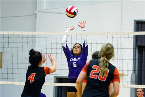 Lady Vikings’ Kara Tatukivel attempts a block.