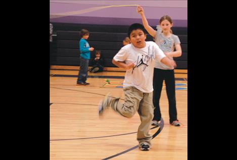 Xavier Pierre jumps mousetrap jump rope, one of his favorites.  