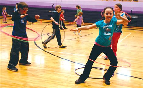 Lexie Gauthier adds some attitude to her hula-hooping. She likes both hula-hooping and jumping rope, it doesn’t really matter which, she said. 