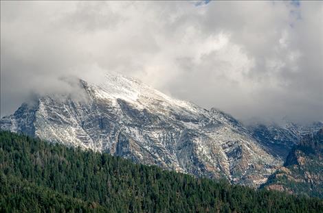 Recent cooler tempatures, rain and snow are helping wildfire suppression efforts.