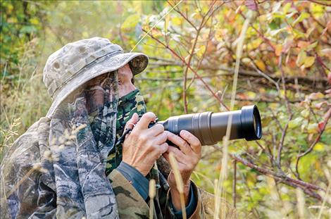 Eugene Beckes waits for the perfect moment to take the shot.