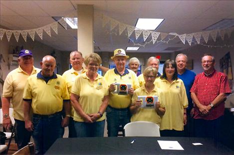 Polson Lions Club recently purchase two vision screening machines thanks to an anonymous donation. Lions Club members pictured with the machines are, front row: Ken Cameron, Mavis Caffrey, Les Cyr, Jan Phillips and Julia Manley; back row: Dennis Devries, Jim Phillips, Greg Devlin, Jim Manley, Bob Gibson and Ken Avison.