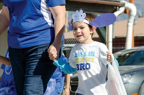 Students from  kindergarten to 12th grade participate in the parade.