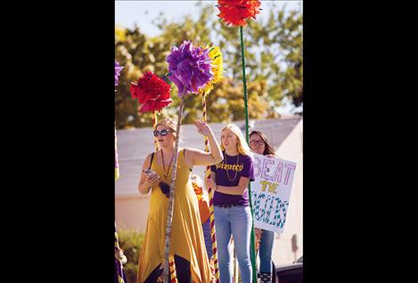 A Polson High School homecoming float moves through town.