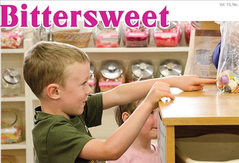 Children select a variety of candies at the Hummingbird in Arlee, where jars of candy, below, have satisfied visitors for 30 years.