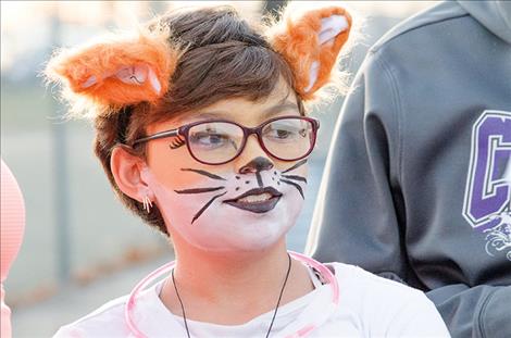 Light the Night participants dressed up in costumes and walked or ran the race course through town.