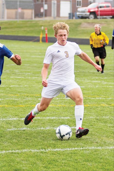 Pirate Mack Moderie takes a shot on goal.