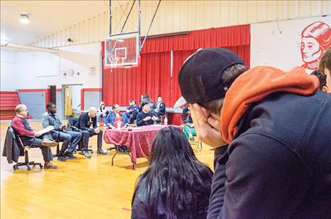 A panel discussion was held in the gym with people representing different countries during a talk about diversity.