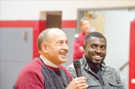 Samir Bitar and Gabe Anash answer questions from Arlee students during the panel discussion.