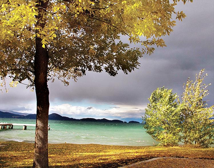 High winds warn of approaching rainy weather from across Flathead Lake.