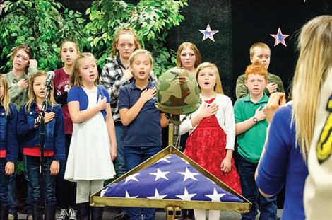 Glacier View School students sing the “Star Spangled Banner” during a program they created to thank veterans.
